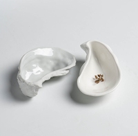 Vaisselle de luxe moderne en porcelaine blanche de haute qualité, assiettes irrégulières et bols pour huîtres et oursins, vente en gros pour restaurants