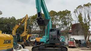 Mini-excavatrice Kobelco SK210LC d'occasion, poids opérationnel de 22 tonnes, avec moteur Cummins, boîte de vitesses, pompe Kawasaki et roulement. - Product Image 6