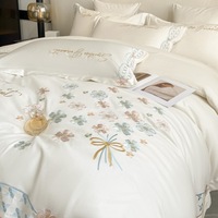 Ensemble de literie en soie véritable de style princesse d'usine ensemble de quatre pièces de drap de lit d'été brodé en soie glacée double face pour un usage domestique