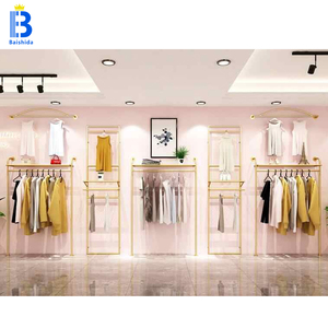 Estante de ropa de Boutique De Oro Ecológico portátil moderno Estantes de exhibición de diseño interior de tienda minorista bonita - Product Image 1