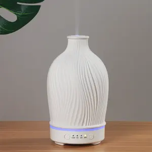Diffusore di olio essenziale ad ultrasuoni personalizzato con 7 luci colorate regalo aziendale per dispositivo di aromaterapia in resina bianca da 100ml