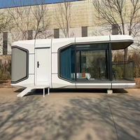 Villa préfabriquée moderne en structure acier légère, type capsule spatiale, avec panneaux sandwich, pour loisirs extérieurs, mini-maison en acier