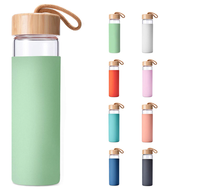 Botol Air Kaca Borosilikat Yomious 20 Oz dengan Tutup Bambu dan Selubung Silikon Bebas BPA