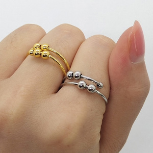 Anillo C de acero inoxidable estilo Ins nueva bola giratoria de doble capa anillo de ansiedad chapado en oro para mujer con piedra principal de circón - Product Image 1
