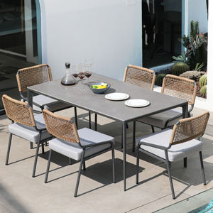 Conjunto de Comedor Moderno de Aluminio para Exteriores con Sillas de Mimbre y Mesa de Piedra/Madera Plástica, Capacidad para 6 Personas, Duradero e Impermeable - Product Image 1