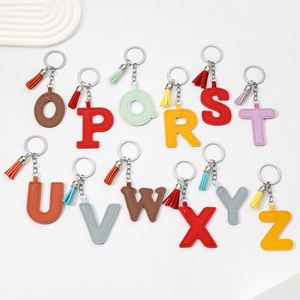 Nouveauté 2025 : Porte-clés en cuir PU avec 26 lettres anglaises et pompons en cuir colorés pour pendentif lettre nominative – Cadeau spécial - Product Image 2