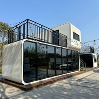 Maison de luxe préfabriquée en conteneur maritime en acier 20ft 40ft, design modulaire contemporain, étanche, installation facile, bureau portable