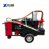 Machine de scellement de fissures routières robuste et durable avec revêtement résistant pour le comblement des joints de routes par les agents routiers