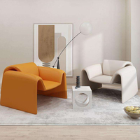 Fauteuil de loisir moderne fait main en cuir synthétique incurvé intégré à un seul siège pour salon et chambre à coucher