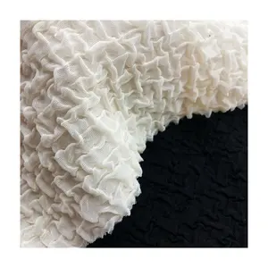 Venta caliente textura arrugada 230gsm 100% pieza de poliéster teñido crepé burbuja jacquard tela para ropa vestido