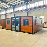 Maison conteneur préfabriquée extensible moderne de 40 pieds, spacieuse, 3 chambres, avec cuisine et salle de bain