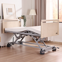 Lit d'hôpital électrique ELBACARE 3 avec barrières latérales en bois, poteau de maintien, garantie 5 ans, certifié CE IEC 60601 pour les soins aux patients âgés
