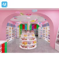 Soporte de exhibición Interior de tienda de dulces, diseño colorido personalizado, estantes de árboles de caramelo, muebles de exhibición