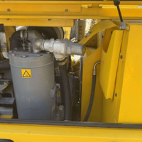 Compresseur d'air à vis diesel Atlas Copco XAS 125 d'occasion, moteur CAT, 7 bars, 6,5 m/min, portable, refroidi par eau, pour l'exploitation minière et la construction