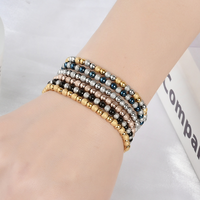 Bracelet Perles Dorées Scintillantes Mixtes en Acier Inoxydable Élastique Étanche – Collection Tendance Chaîne & Maillons – Offre Spéciale