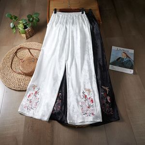 Traditional Chinese Embroidered Wide Leg Pants Black And White Loose Fit Casual Pants For Women With Floral Design - Product Image 1