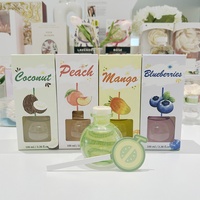 Diffuseur de roseaux de fruits d'été durables personnalisé désodorisant de bouteille en verre ronde colorée pour voitures pour l'été