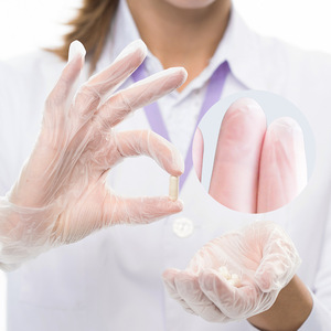 Gants jetables en vinyle Intco, sans poudre, texture lisse et complète, pour la manipulation des aliments, protection des mains, usage unique - Product Image 2