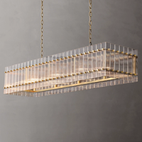 Lustre rectangulaire moderne de luxe américain de 54 pouces en laiton fini avec verre cannelé transparent fait main pour salon et salle à manger