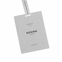 Étiquette suspendue personnalisée en papier gaufré texture coquille d'œuf, écologique, encre noire mate, fente horizontale, pour programme d'étiquetage de marque