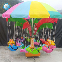 Équipement d'amusement attrayant pour enfants Chaise volante électrique 8 places avec lumière et musique Mini carrousel pour enfants