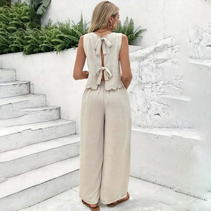 कस्टम महिलाओं की गर्मियों की मांसपेशियों को सरल रोजमर्रा की पुरानी मनी स्टाइल लिनन टाई दो टुकड़ा सेट शेल ट्रिमेम्ड स्लीवलेस टॉप और पैंट सेट - Product Image 3