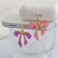 Breloques anti-poussière pour téléphone avec nœud mignon, pendentifs décoratifs en émail en forme de nœud pour port de charge USB-C, accessoires décoratifs
