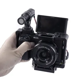 Hot-Sale-DSLR-Kamera käfig mit eingebauter Schnell wechsel platte Unterstützung Sony A6300 A6400 A6500 mit NATO-Schiene und Position ierungs löchern