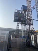Équipement de levage de matériaux de construction, palan à double cage SC100/100 à vitesse moyenne, moteur, commande PLC haute performance