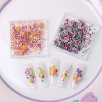 JIASI JS-XGH Mini Boîte d'autocollants pour nail art avec fleurs séchées naturelles 3D colorées mélangées