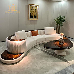 इटैलियन लाइट लग्जरी कर्व्ड मॉड्यूलर सोफा हाई ग्लॉस पेंट अखरोट लेदर सोफा मूवी स्टूडियो सोफा - Product Image 2
