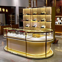 Vitrine de luxe pour bijoux en verre trempé, construction métallique, éclairage LED, couleur/taille personnalisable, options de finition multiples