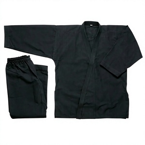 Conjuntos de Uniformes de Karate Negros Personalizados para Artes Marciales - Poliéster/Algodón de la Mejor Calidad, Antiencogimiento, Secado Rápido, Corte Holgado - Product Image 1