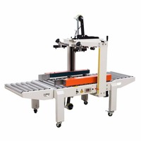 Scelleuse de cartons électrique automatique CE certifiée FXC5050 avec bande adhésive latérale pour emballage de produits chimiques et textiles