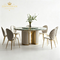 Table à manger ronde de luxe en marbre vert avec plateau tournant Lazy Susan, base cannelée, panneau doré, mobilier moderne pour hôtels et restaurants