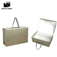 Boîte d'emballage de chaussure pliable en carton ondulé rose et noir avec logo personnalisé en gros avec poignée
