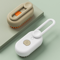 Brosse de toilettage multi-usages pour animaux de compagnie avec pulvérisation électrique à vapeur, design pliable 3 en 1 pour chats et chiens