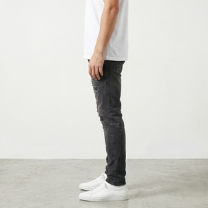Jeans en denim noir déchiré pour homme, coupe skinny, effet éclaboussures de peinture, style streetwear, vente en gros, jeans de haute qualité - Product Image 3