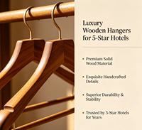 Cintres en bois de luxe de qualité supérieure pour hôtel, en noyer brun, hêtre et bois de lotus, avec clip, personnalisables avec logo, pour boutique