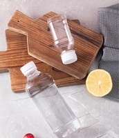 Bouteille de boisson transparente sans BPA de 250 à 1600 ml, bouteille en plastique PET vide personnalisée pour l'eau minérale