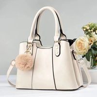 Sac fourre-tout en cuir PU grande capacité pour femme avec pompon, fermeture éclair, poignée supérieure portable, sac à bandoulière, sac de maman en polyester