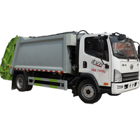 Camion compacteur de déchets à chargement arrière manuel FAW Jiefanghu VH 4x2 - 8-12 mètres cubes pour une collecte efficace des déchets municipaux