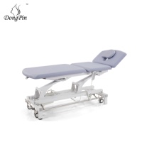 Table de physiothérapie électrique Dongpin Lit de massage médical réglable de conception moderne pour le traitement et l'examen pour le salon