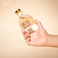 Bouteille de diffuseur d'arôme en verre vide en demi-cercle transparent créatif de 30 ml 50 ml 100 ml avec bouchon d'étanchéité pour l'aromathérapie
