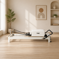 Reformer de Pilates en bois professionnel personnalisable, équipement de rééducation durable pour studio de yoga ou de gym