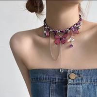 Collier ras du cou Y2K avec pendentif papillon violet et pompon, design tendance et cool, bijou fantaisie pour femme, idéal pour un cadeau