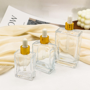 Tại Chỗ Phẳng Vuông Hình Chữ Nhật Sang Trọng 15Ml 30Ml 50Ml 100Ml Chai Thủy Tinh Nhỏ Giọt Với Cổ Áo Vàng Cho Huyết Thanh Tinh Dầu - Product Image 2