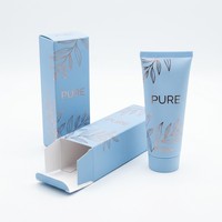 Boîte personnalisée en papier bleu clair avec motif feuille estampé argenté pour emballage de produits de soin naturels