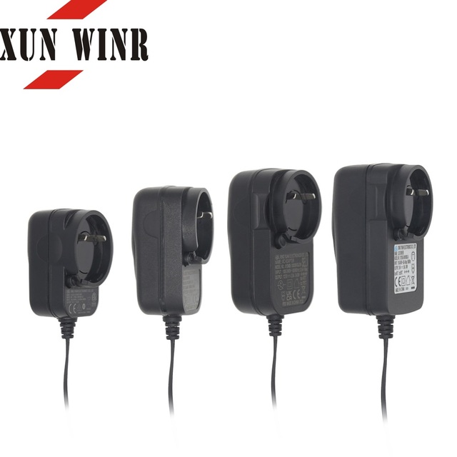 High Quality US EU UK AU Interchangeable Plug AC/DC Power Adapter with PC Material for Electronic Products