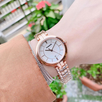 Montre à quartz pour femme, petite et élégante, en acier inoxydable, T094, aiguilles lumineuses, cadran or rose 26 mm, étanche